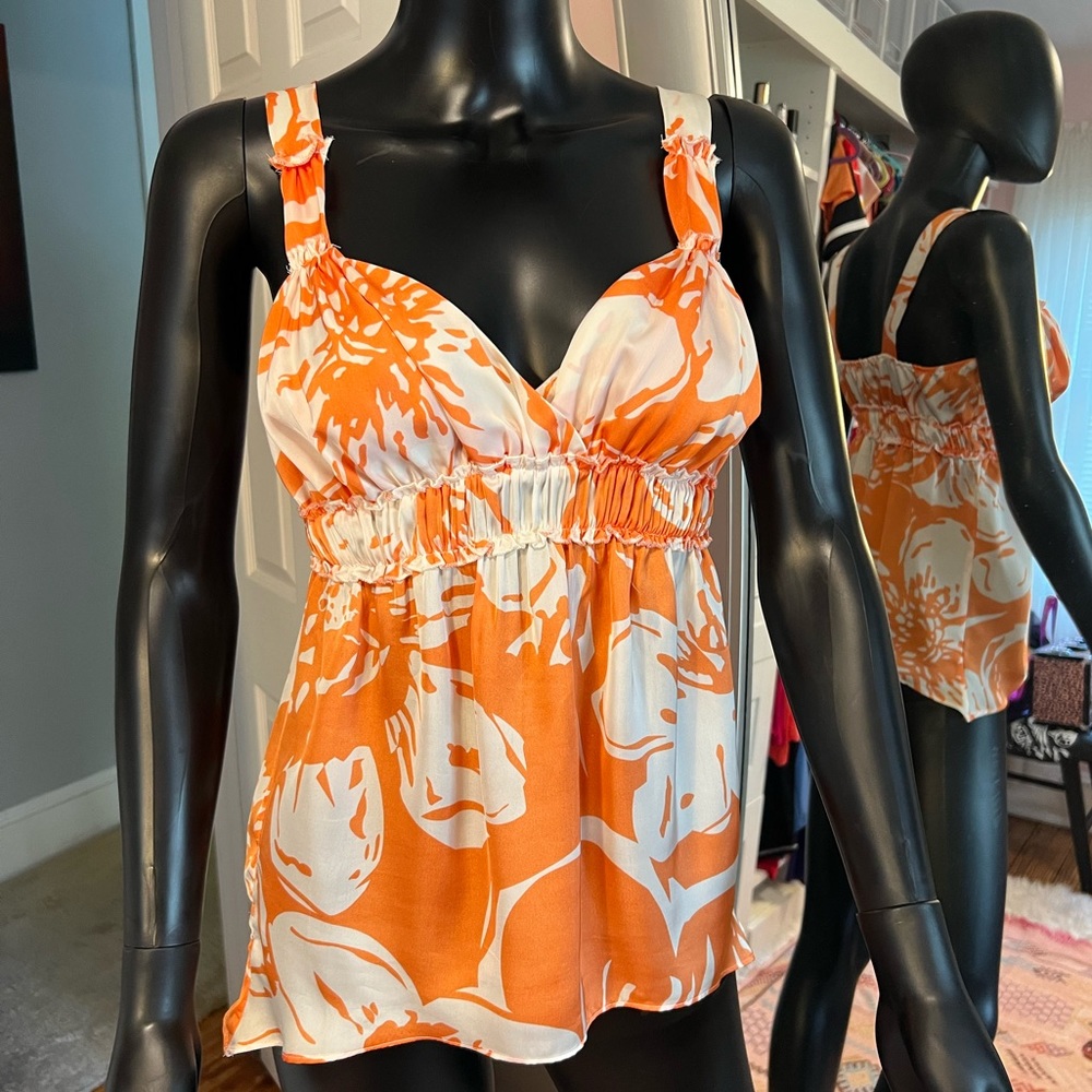 Orange and white shirt size small
